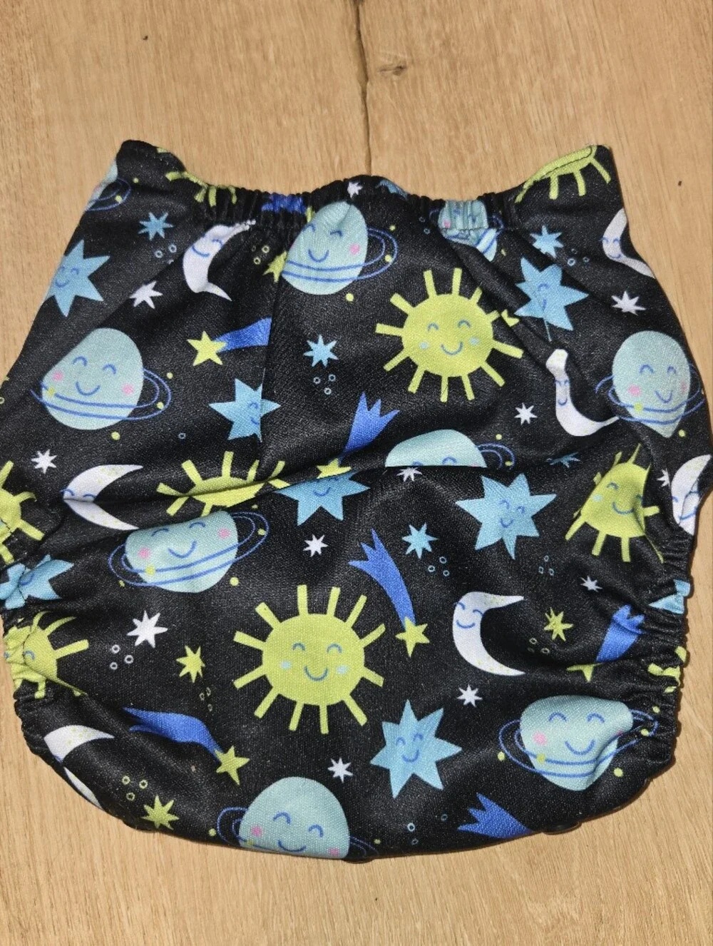 Kinder one size pocket cloth diaper planet print